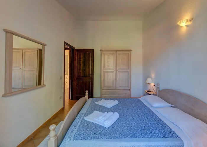 Апартаменты I Giardini Di Badus 4 People *